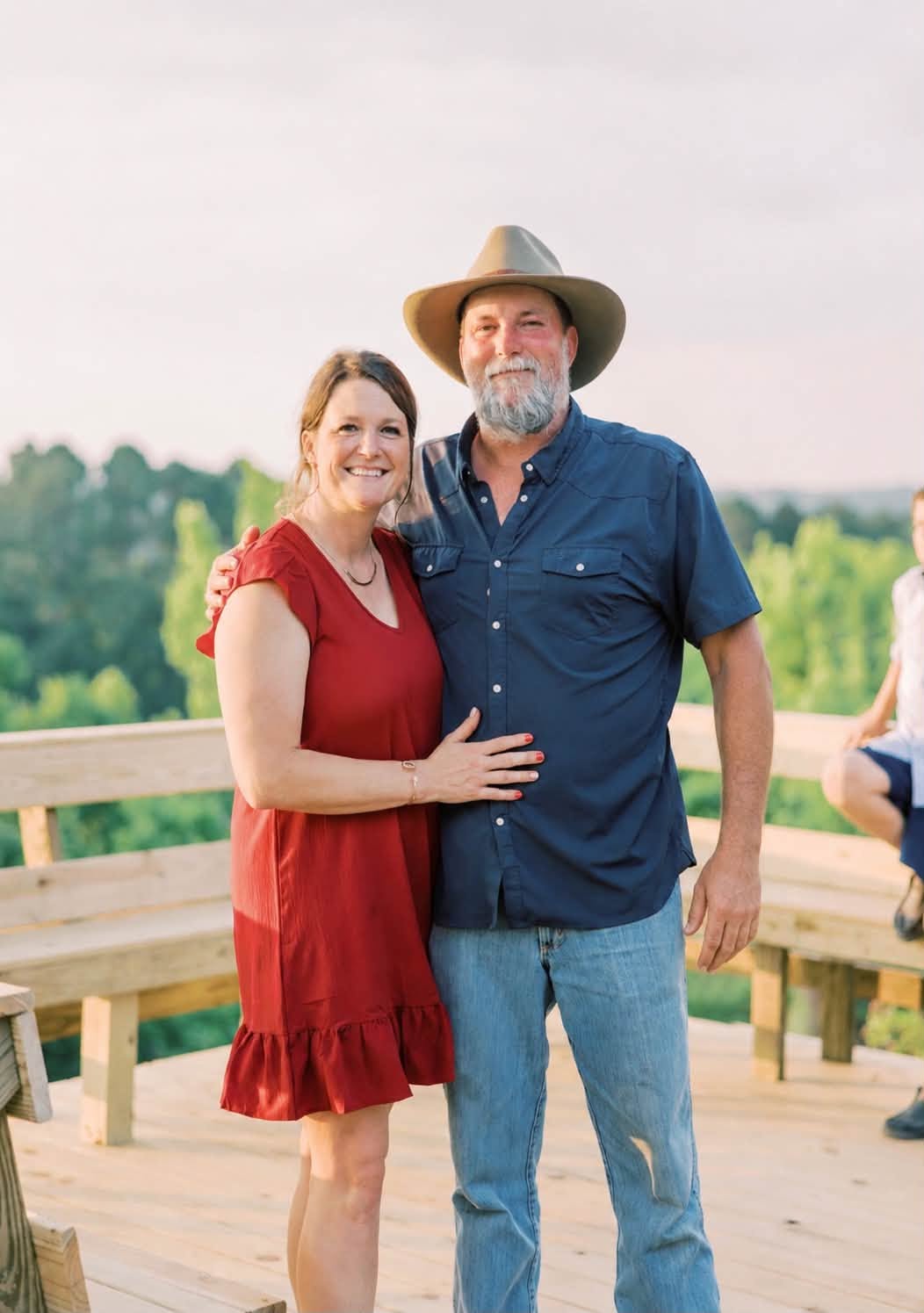 Dandy and Karen Bergman standing together outdoors at The Tower